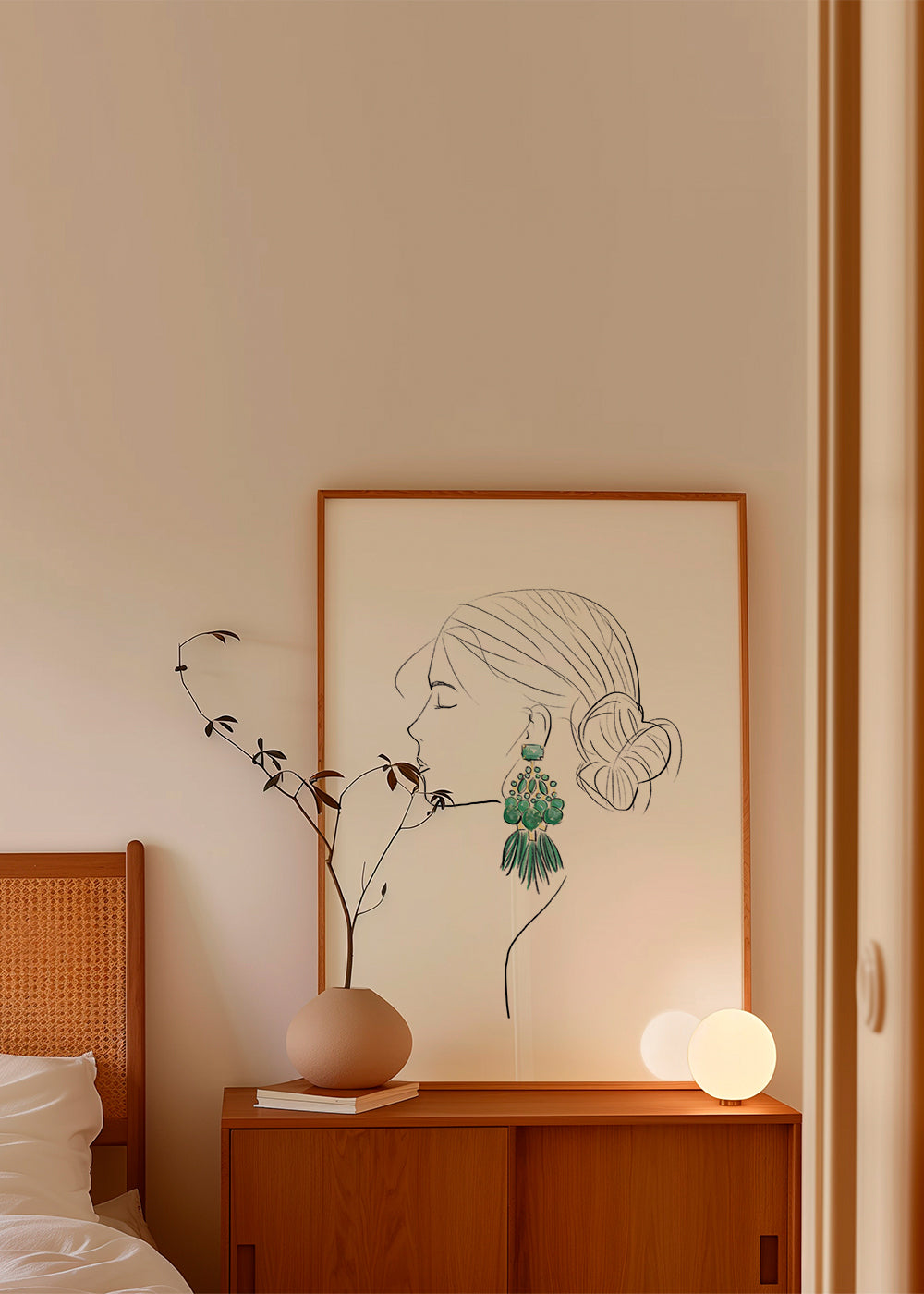 Illustration profil av kvinna med gröna örhängen
