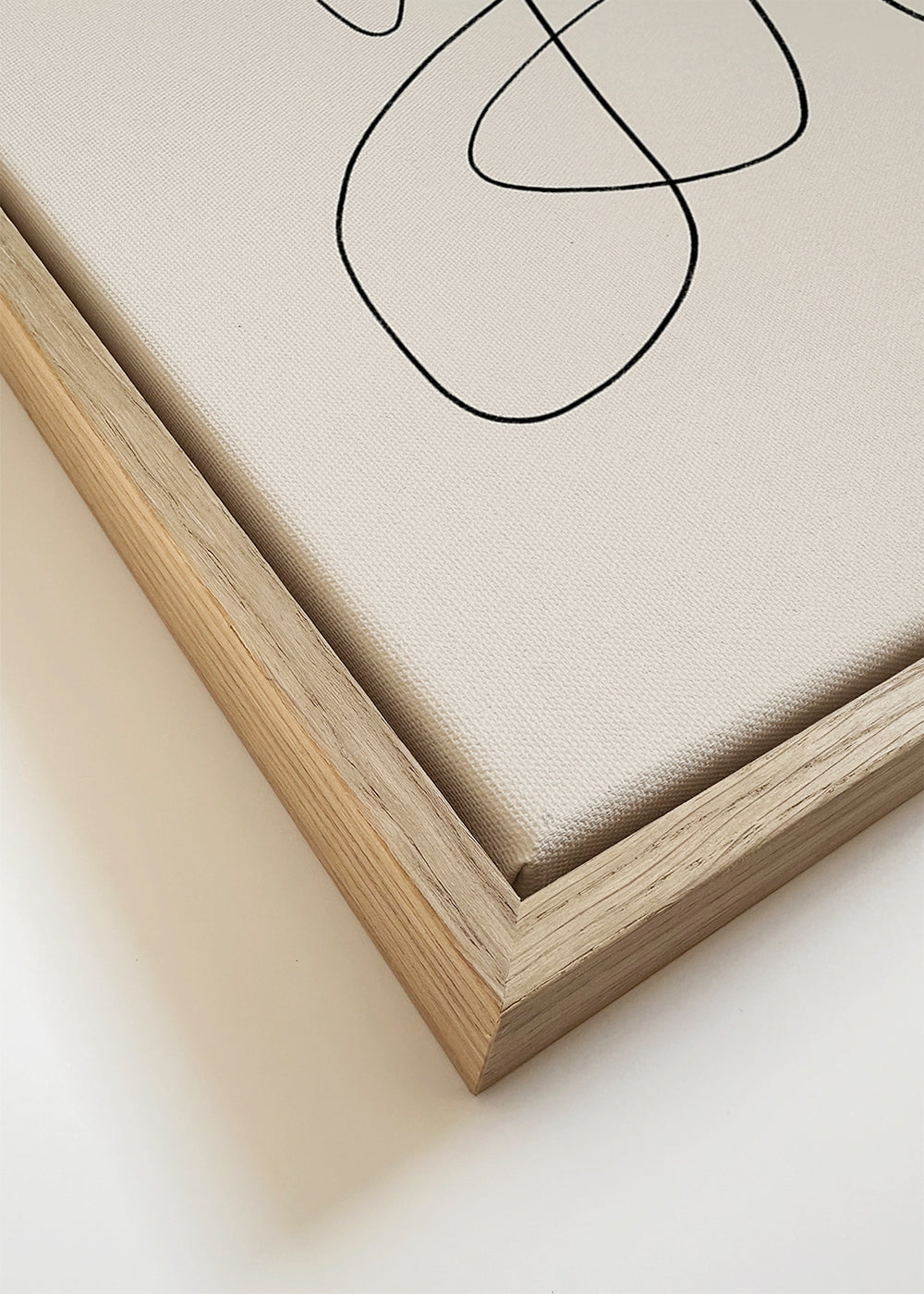 Minimalistisk design med kontinuerlig linje på beige bakgrund