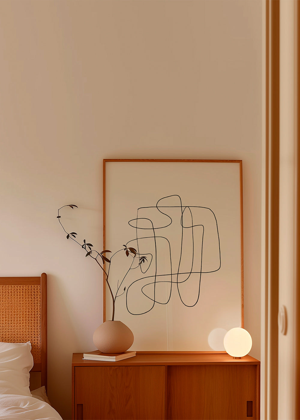 Minimalistisk design med kontinuerlig linje på beige bakgrund