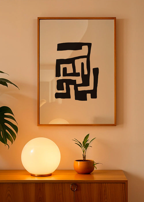 Abstrakt konst i svart på beige bakgrund