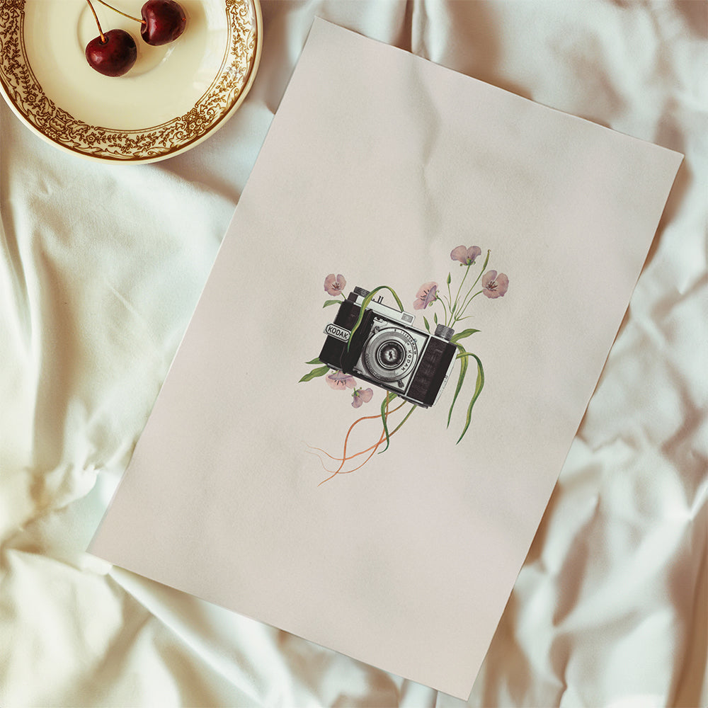 Vintage-kamera med blommor