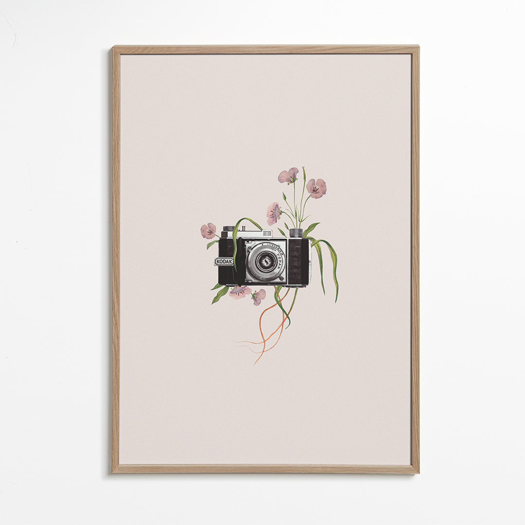 Vintage-kamera med blommor