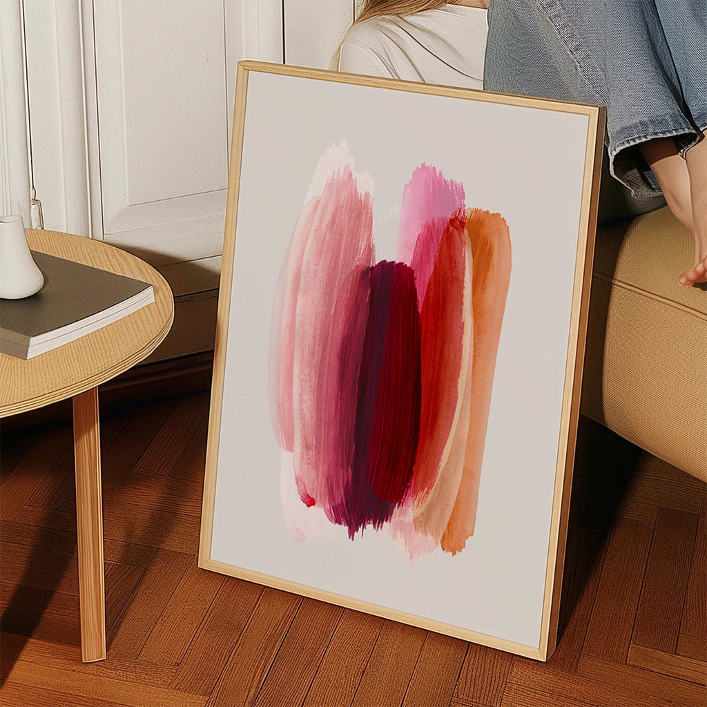 Abstrakt konstverk med rosa och orange penseldrag