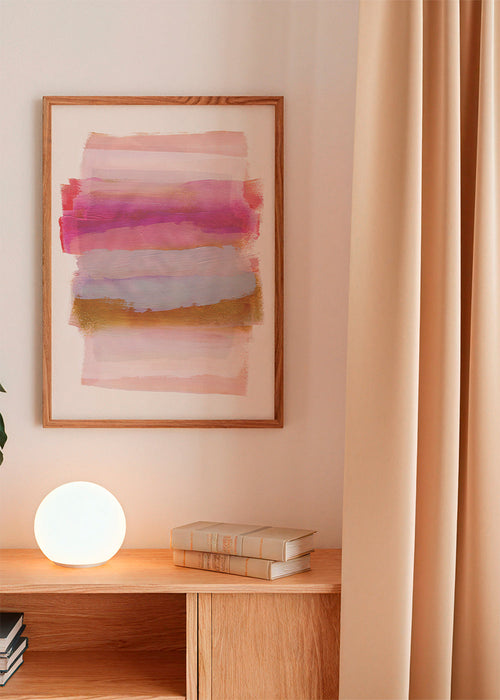 Abstrakt konst med rosa och gyllene penseldrag