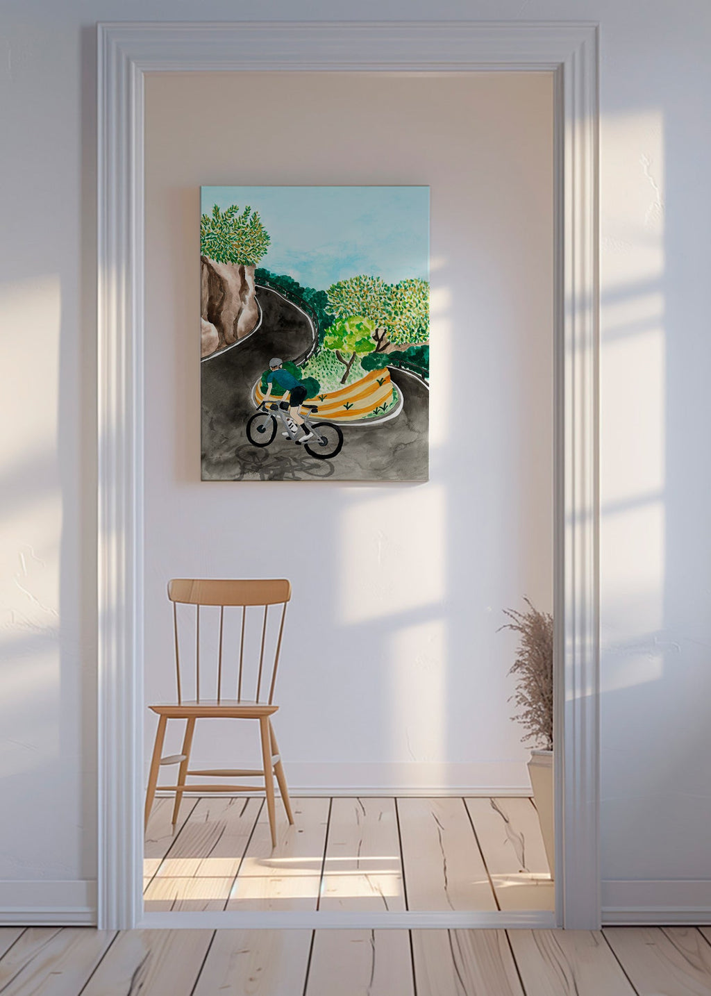 Landskapskonst med cyklist i bergskurva