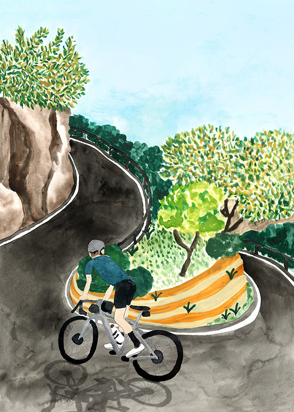 Landskapskonst med cyklist i bergskurva
