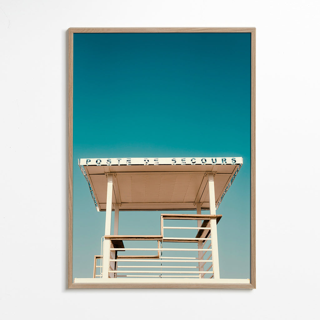 Fotografi livräddartorn mot blå himmel – Oak Frame