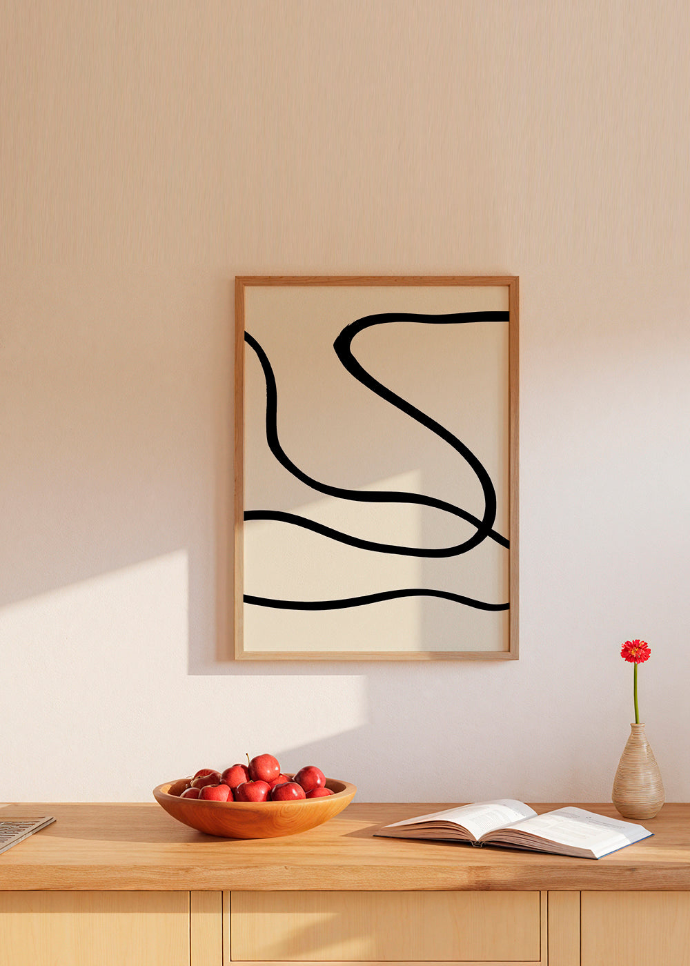 Minimalistisk tavla med svarta linjer på beige