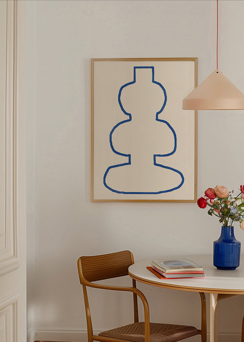 Minimalistisk tavla med blå kontur