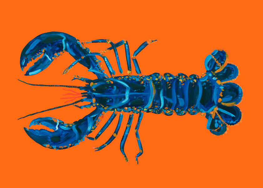 Kökskonst: blå hummer mot orange