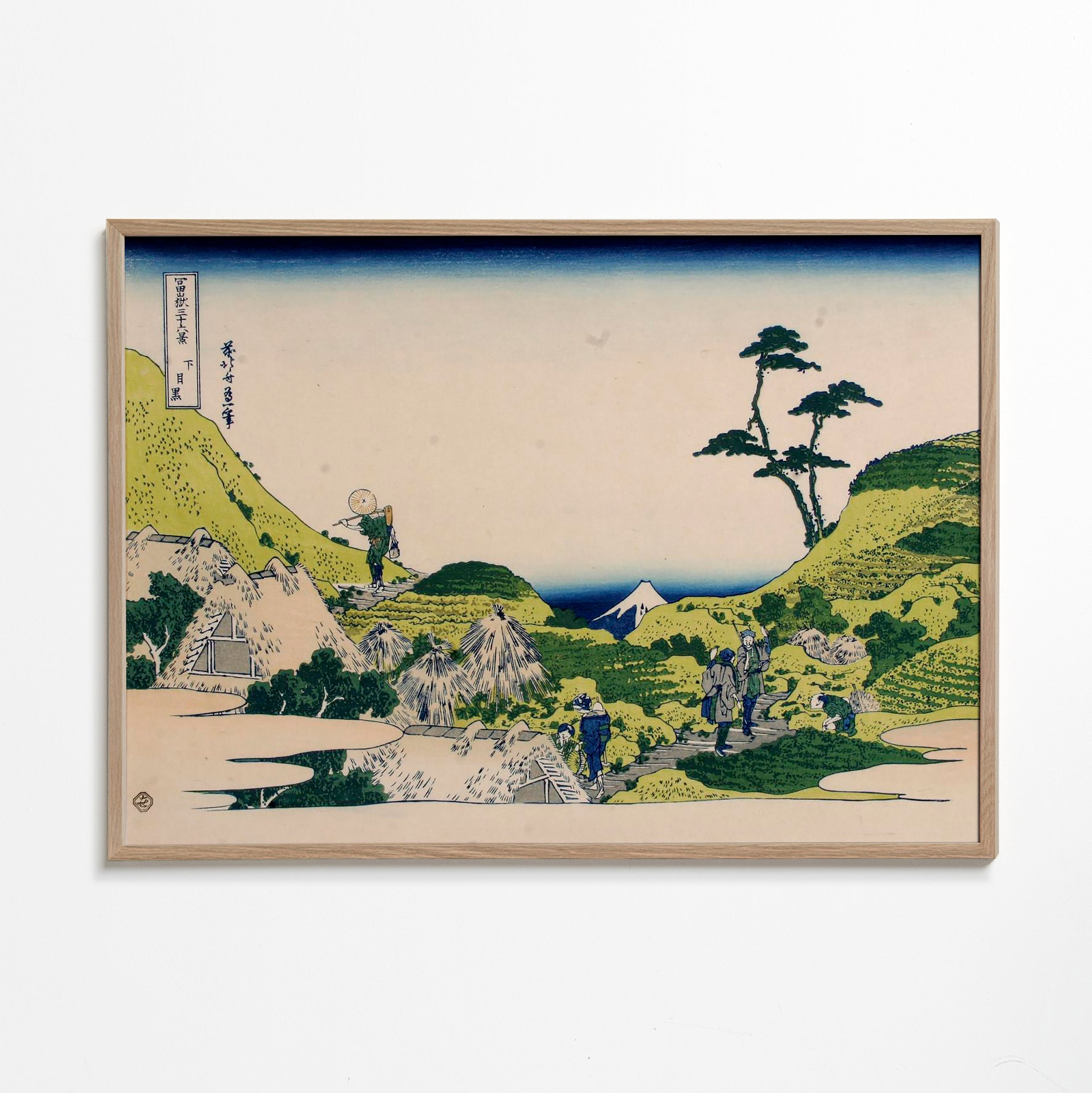 Landskapsbild med Mount Fuji och gröna kullar