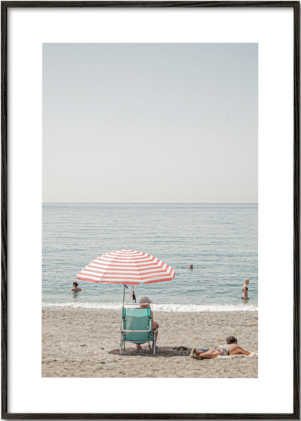 Landskapskonst: parasoll vid stranden