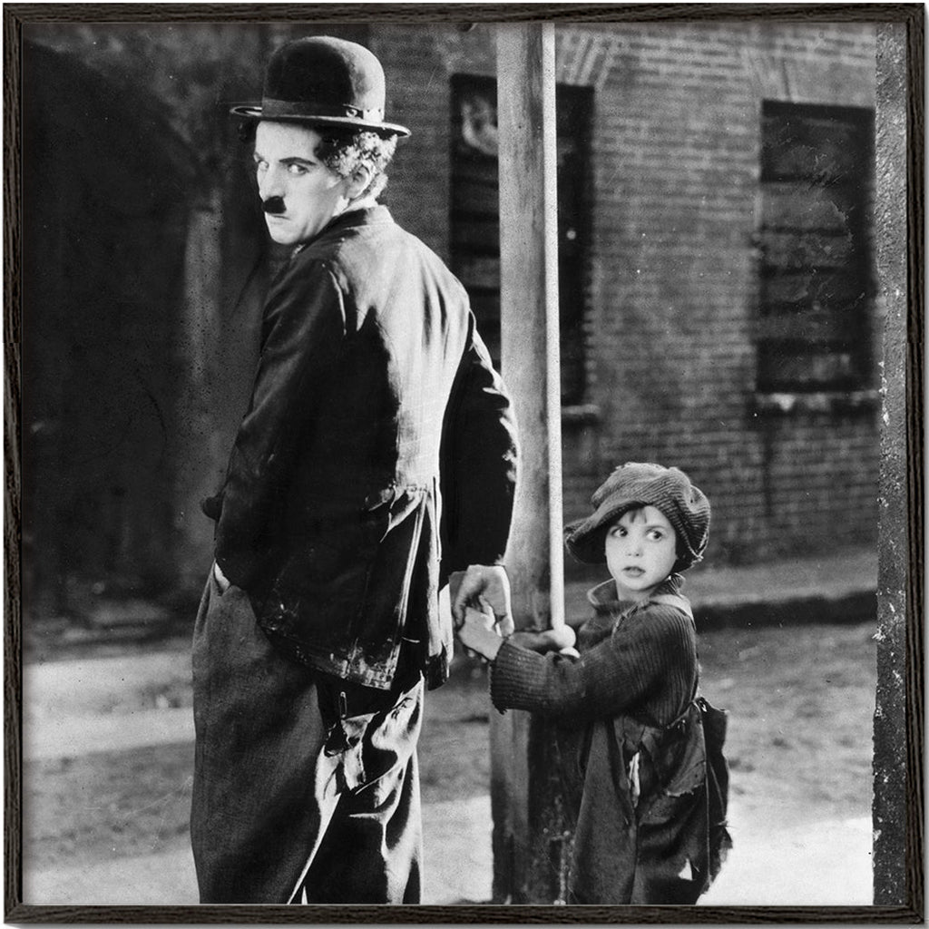 Vintage-porträtt: man med bowlerhatt och barn