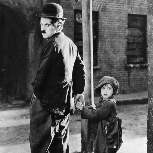 Vintage-porträtt: man med bowlerhatt och barn