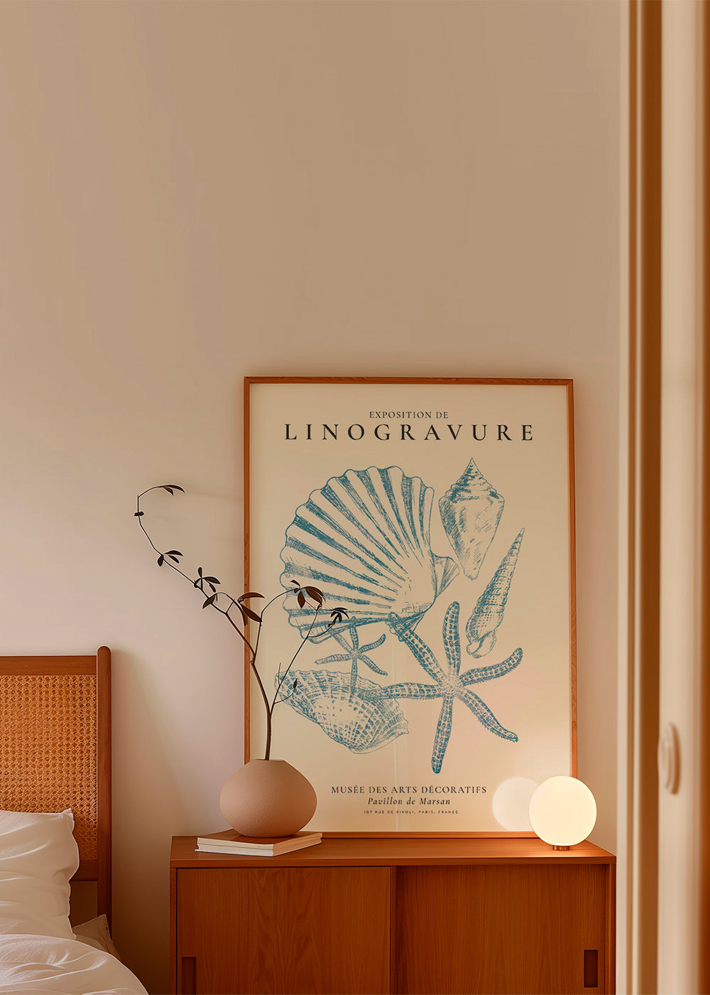 Linoleumssnitt med snäckor i blått