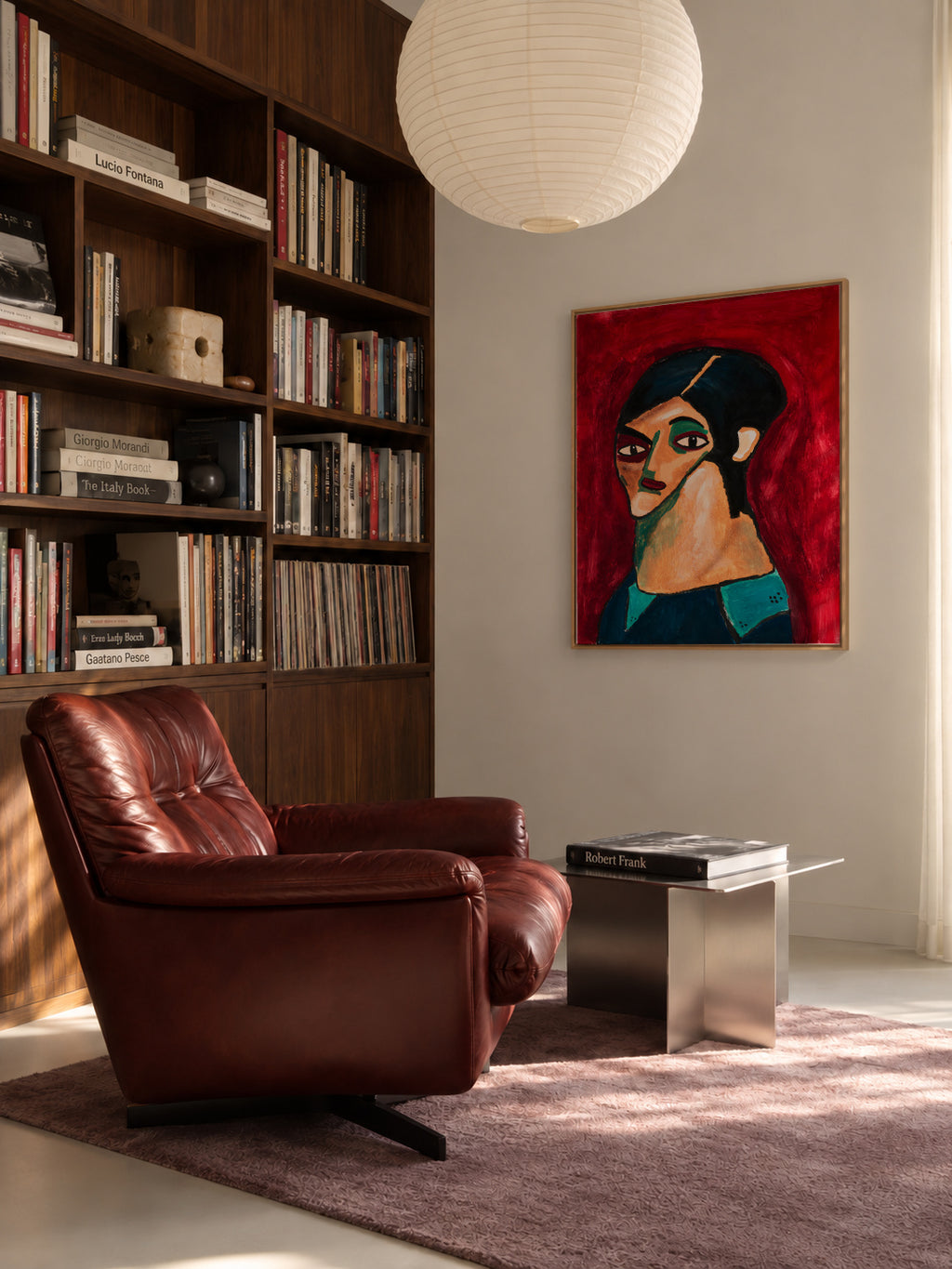 Ojos negros - Jesús Llorente - Framed canvas in an interior