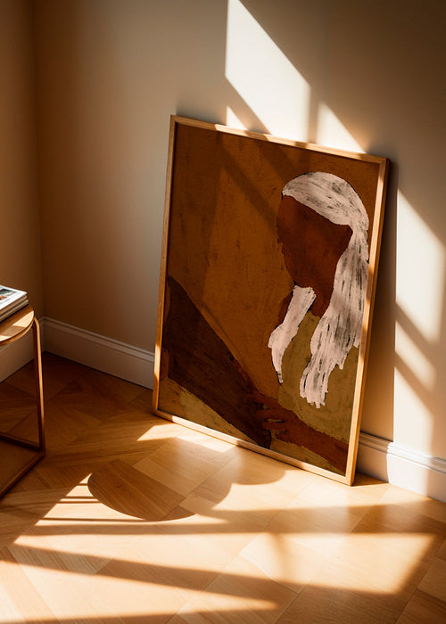 Abstrakt konst: figur läser i jordtoner