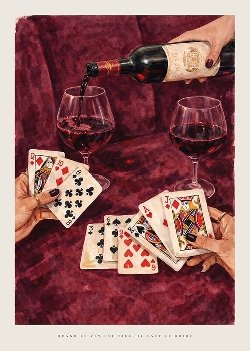Kökskonst med spelkort och rött vin