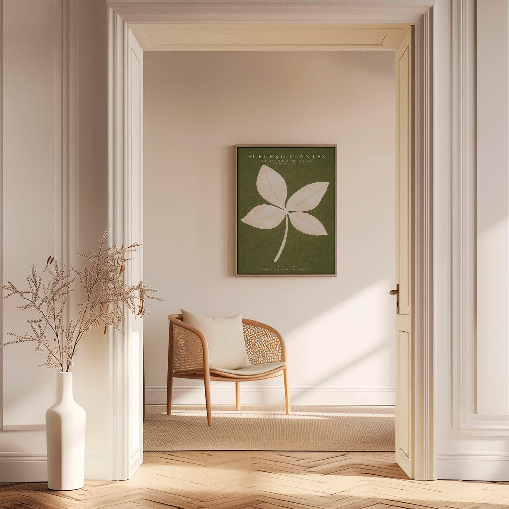 Botanisk print: krämfärgat blad mot grönt fält