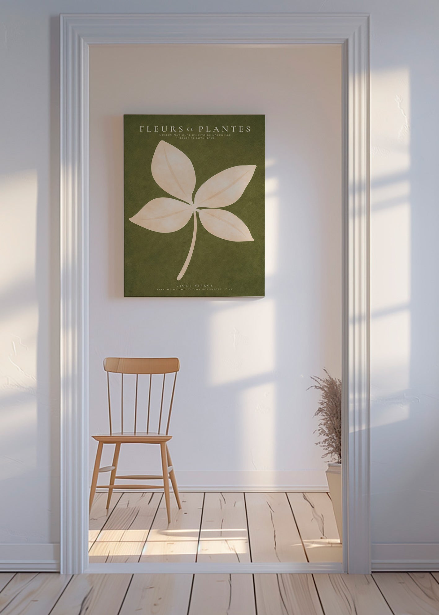 Botanisk print: krämfärgat blad mot grönt fält