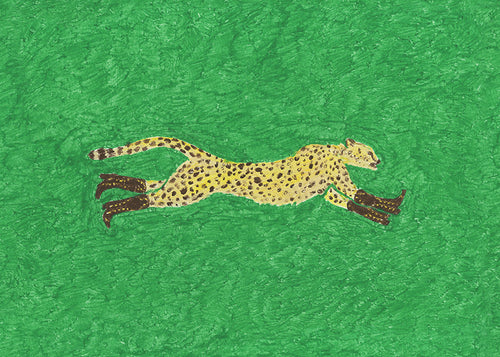 Springande gepard på grön bakgrund