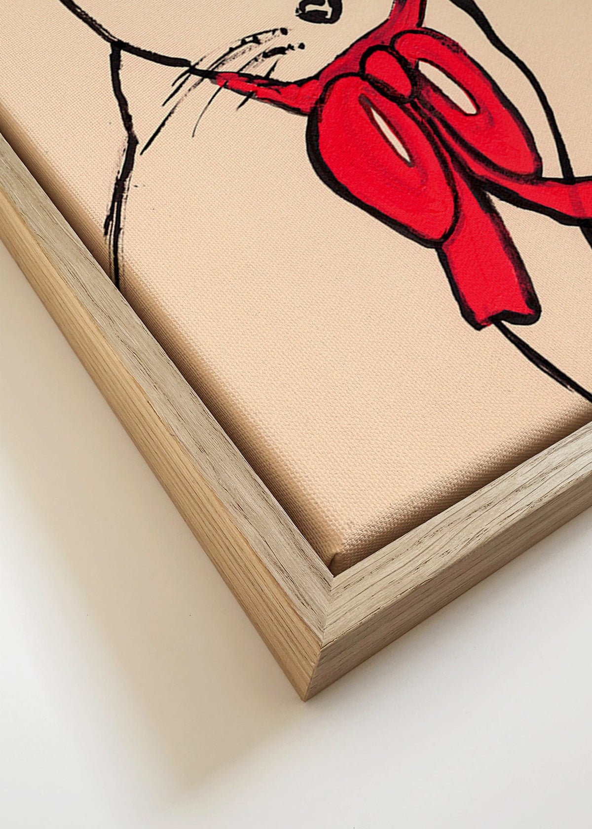 Kattmålning med röd rosett och ledig linje – Canvas detail