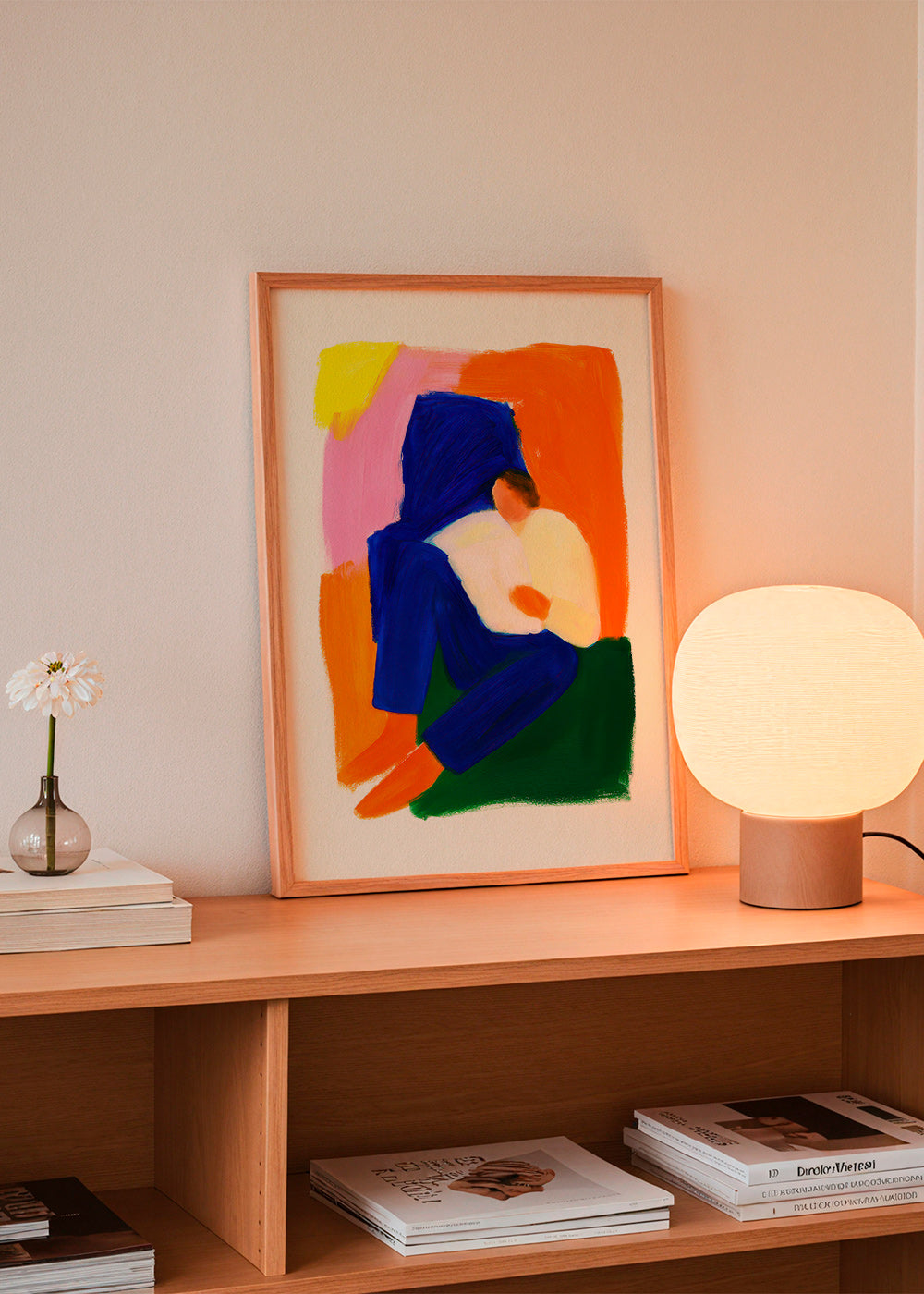 Illustration av sittande figur i klara färger – Product3