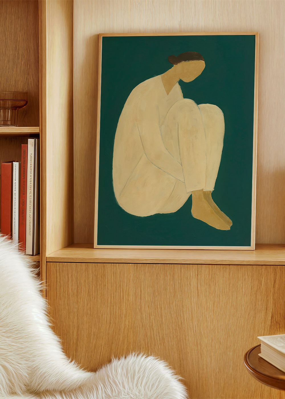Minimalistisk tavla med sittande figur på grön bakgrund – Product2