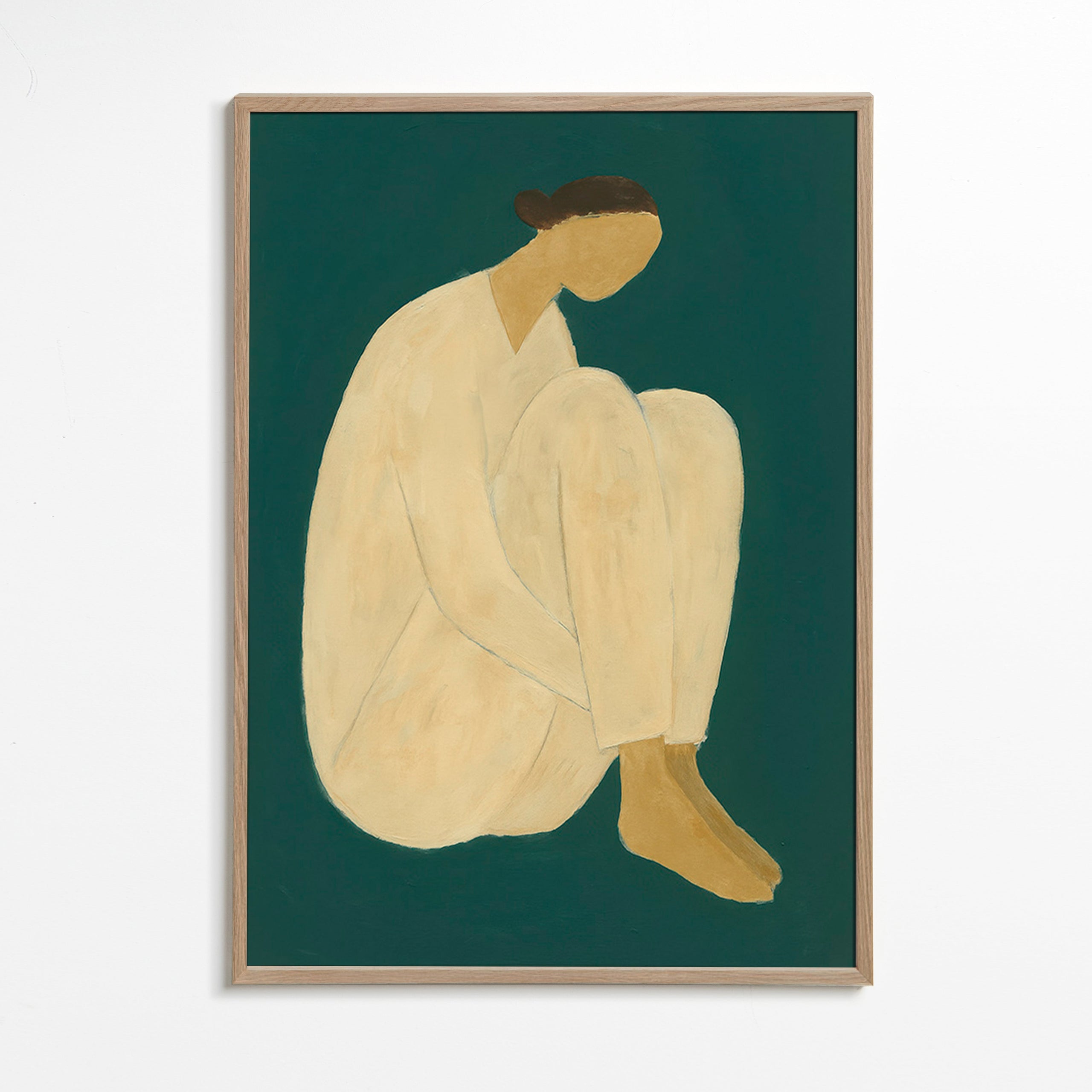 Minimalistisk tavla med sittande figur på grön bakgrund – Oak Frame