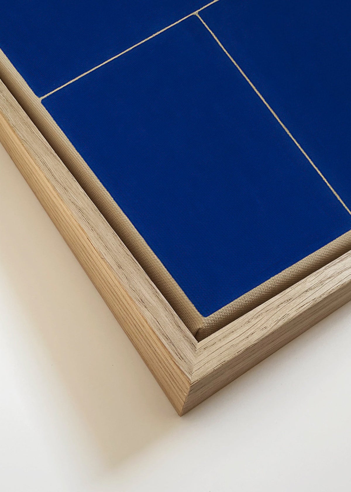 Geometrisk tavla med blå paneler – Canvas detail