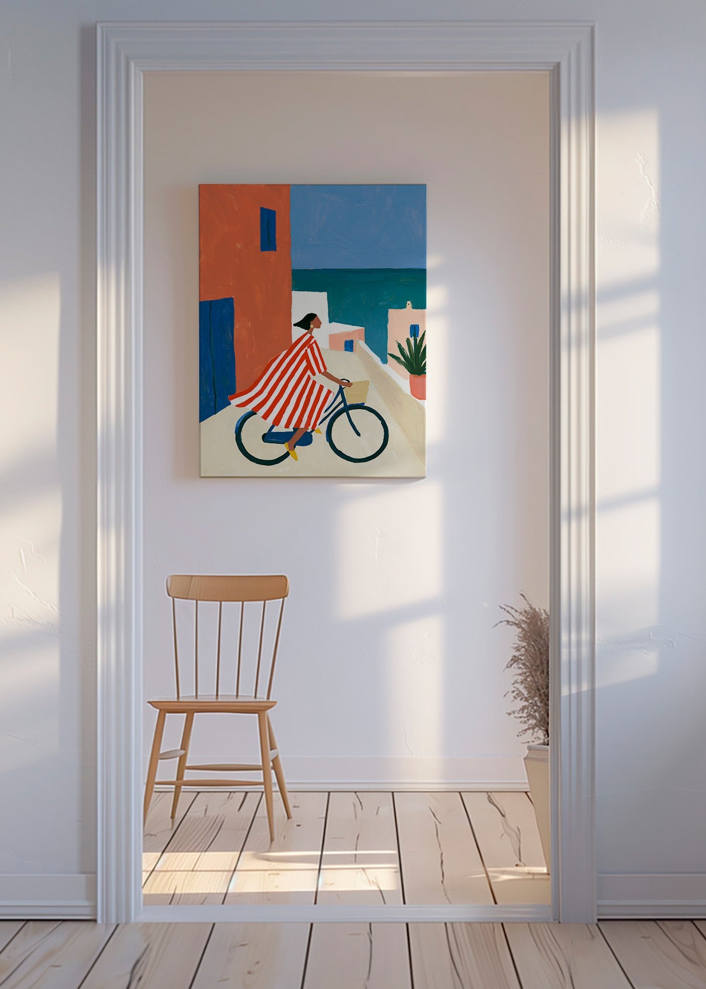 Landskapskonst med cyklist vid havet
