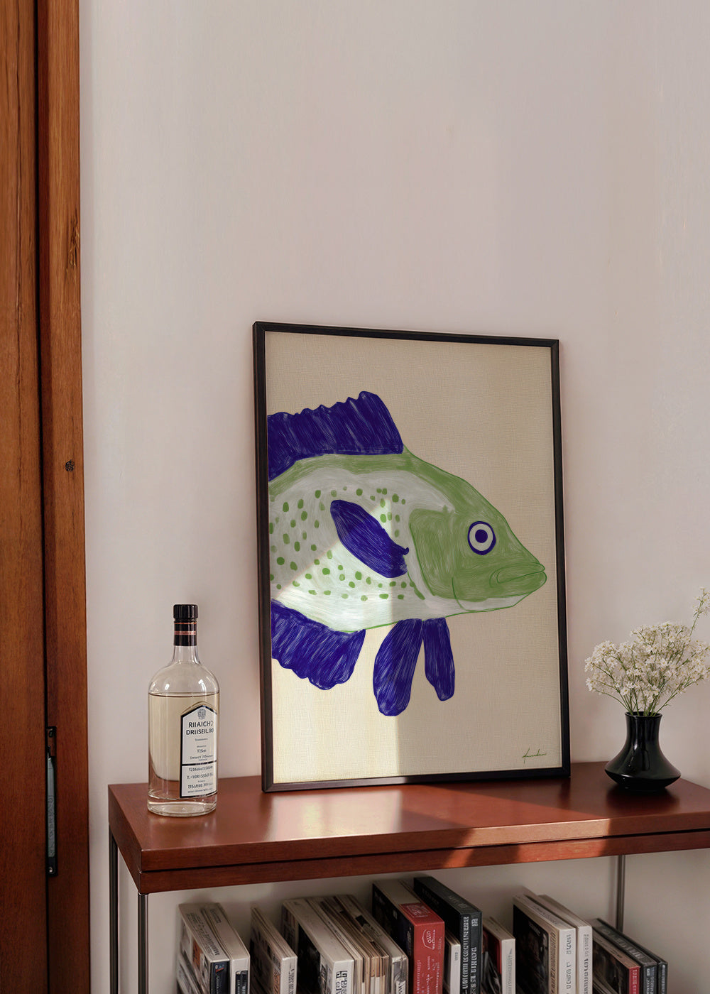 Green Fish - Framed poster in an interior