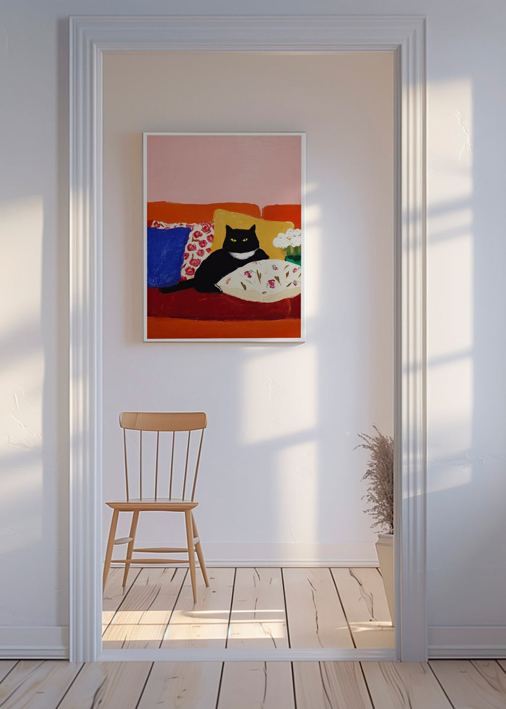 Konstverk svart katt på färgglad soffa
