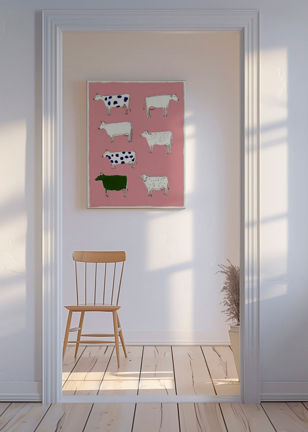 Konstverk med lekfulla kor på rosa bakgrund