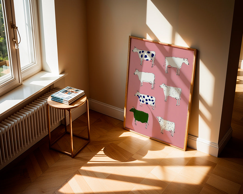 Konstverk med lekfulla kor på rosa bakgrund