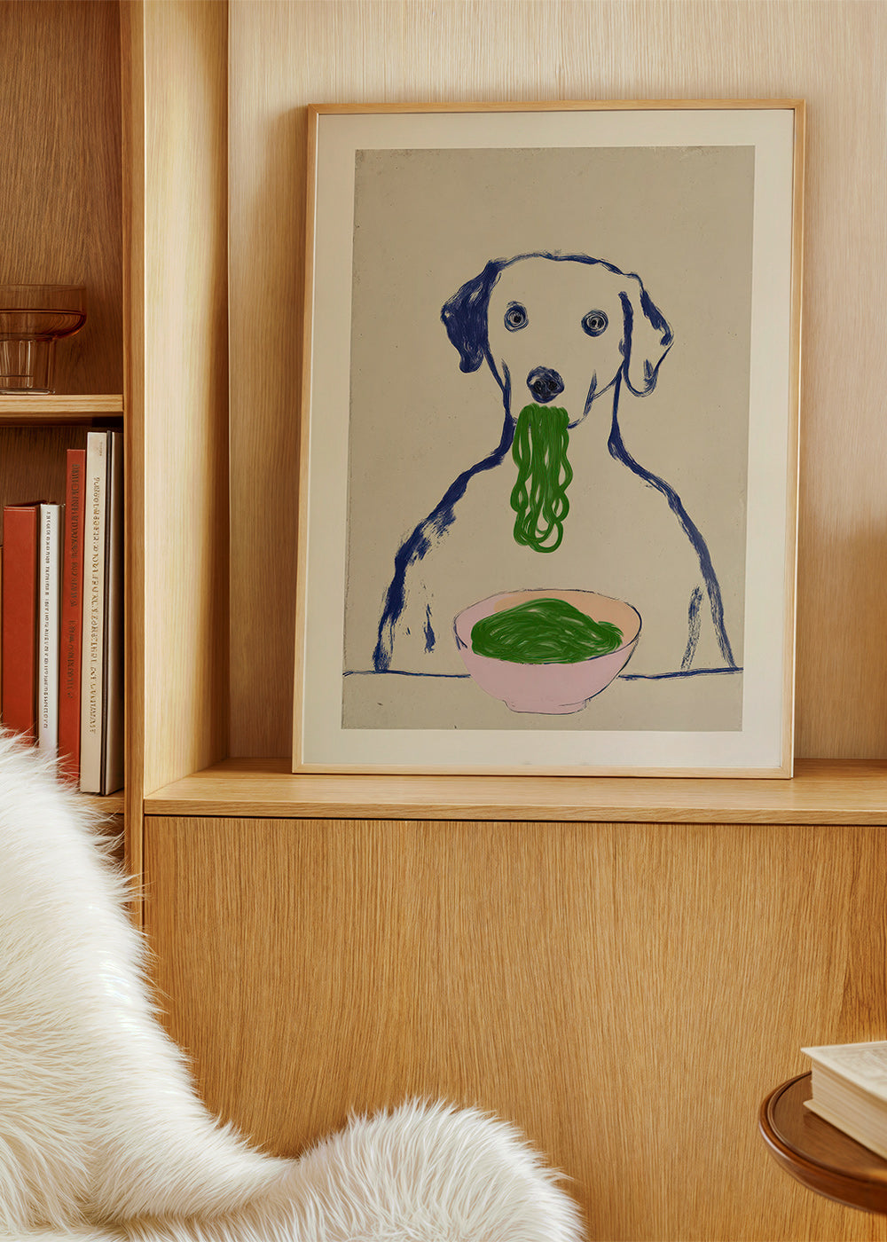 Kökskonst: hund som äter nudlar