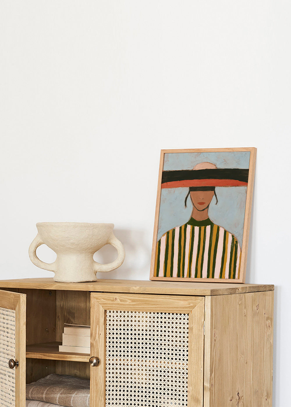 Illustration av figur med bred hatt