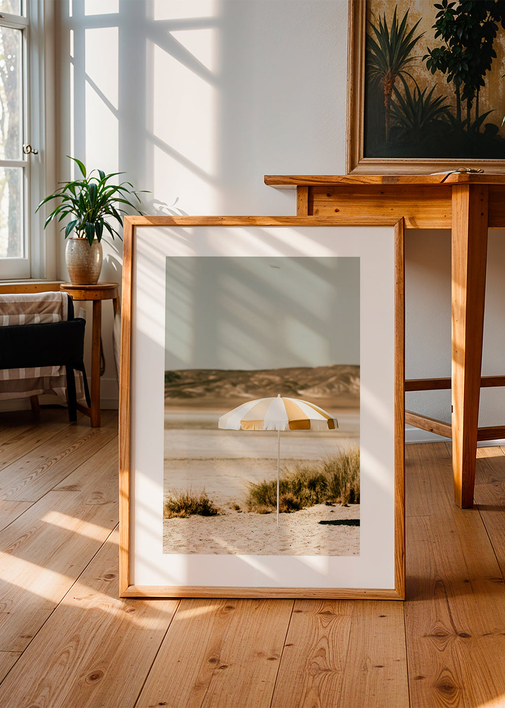 Landskapskonst med randigt strandparaply