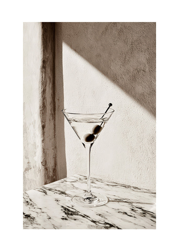 Kökskonst Martini i glas på marmor