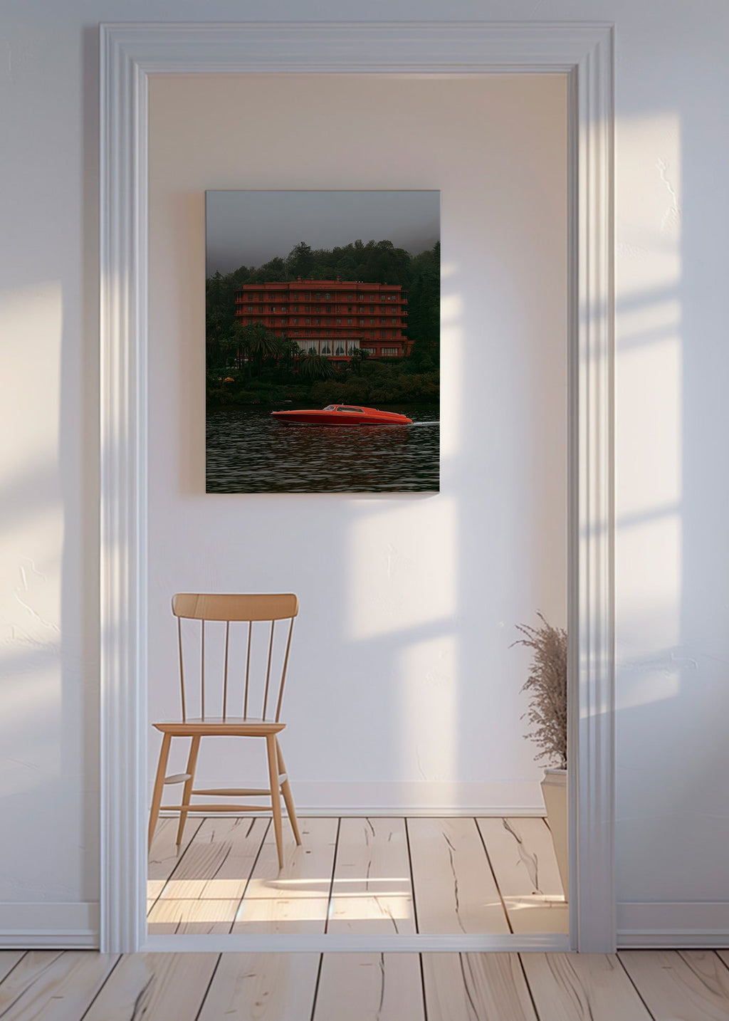 Landskapskonst med rött hotell och snabb båt